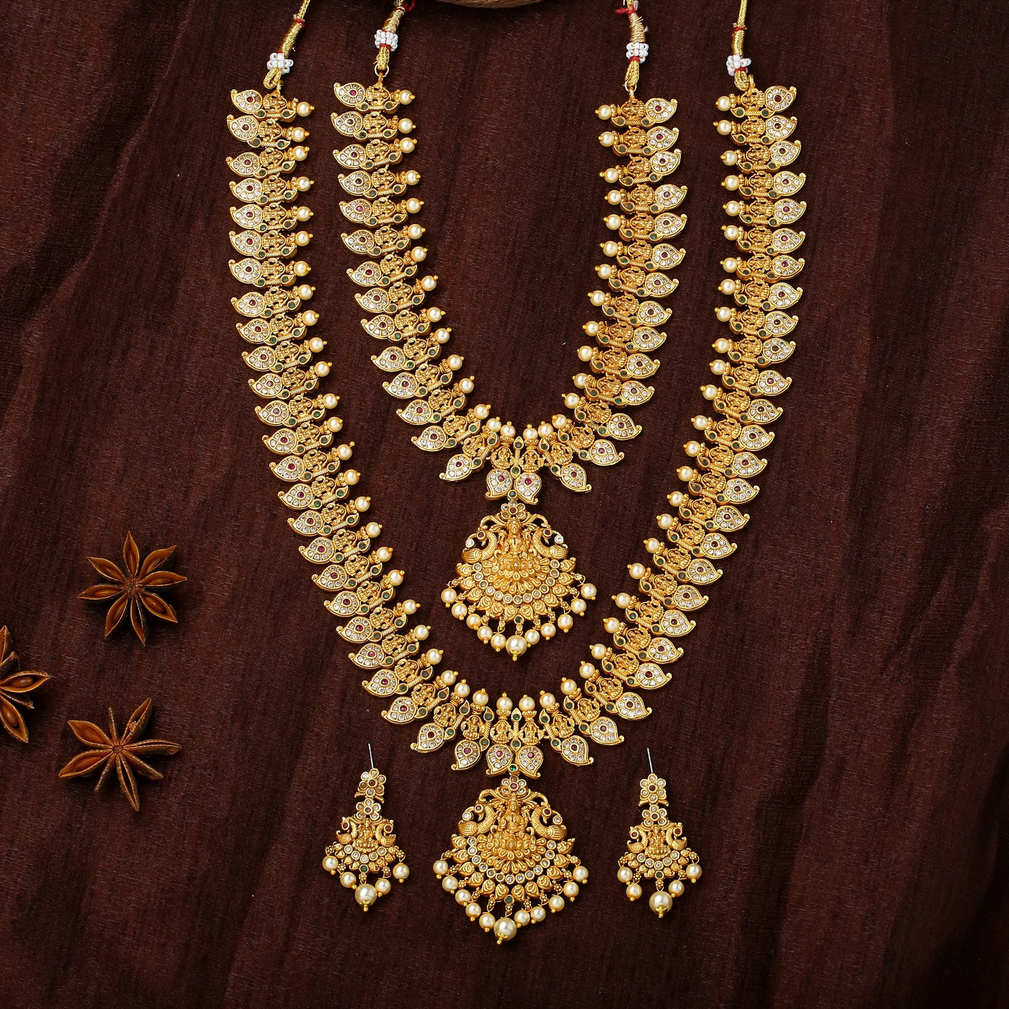 Estele Gold Plated CZ Laxmi Ji with Paisley Motifs Bridal Short & Long Necklace Set with color stones & Pearls