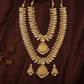 Estele Gold Plated CZ Laxmi Ji with Paisley Motifs Bridal Short & Long Necklace Set with color stones & Pearls